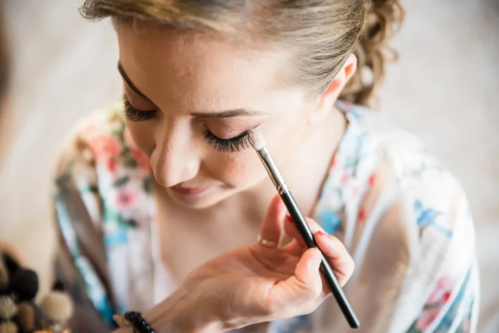 makeup-artist-preparing-bride-before-the-wedding